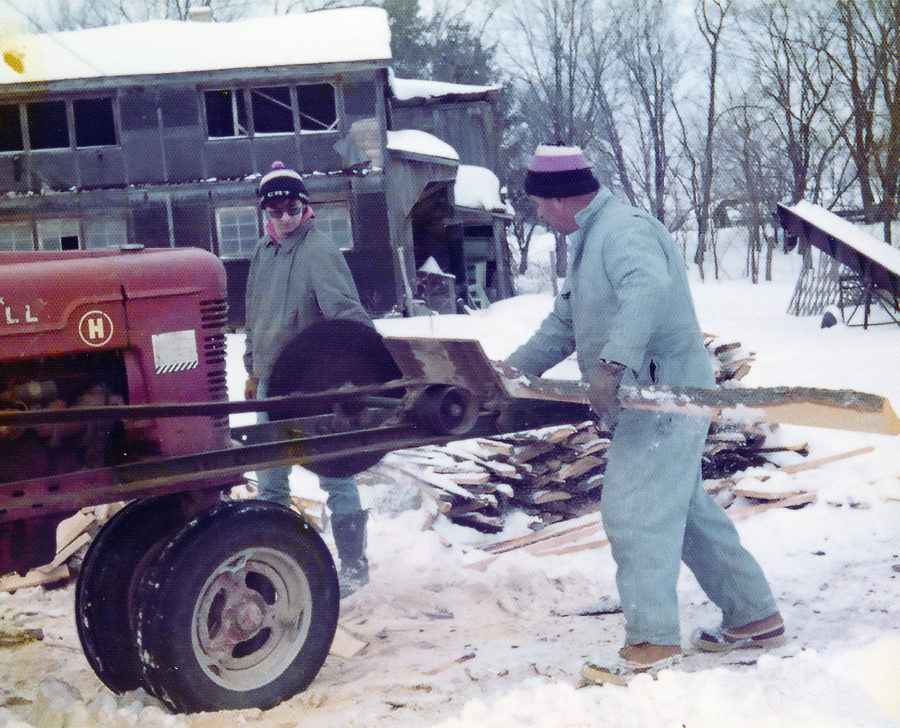 Mark and Pop Cutting Wood