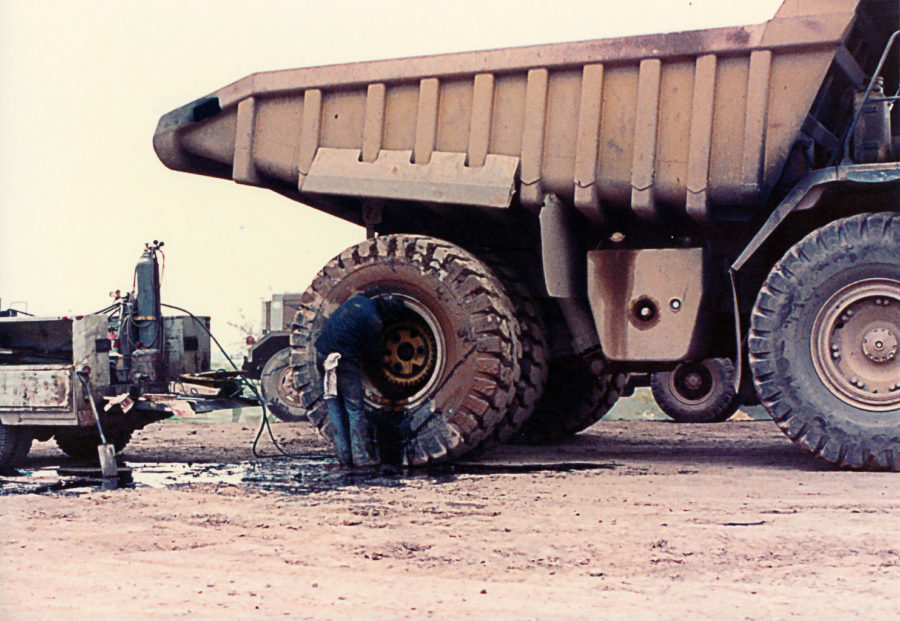 Working on Cat Dump Truck